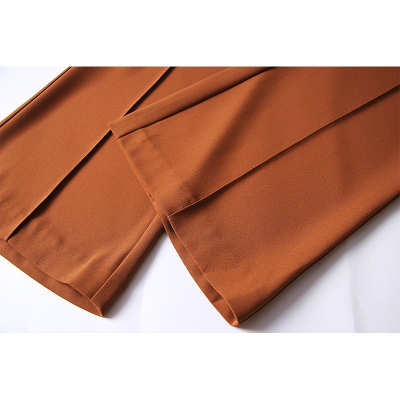 Brown high-waisted flared-leg pants with gold-tone chain embellishment