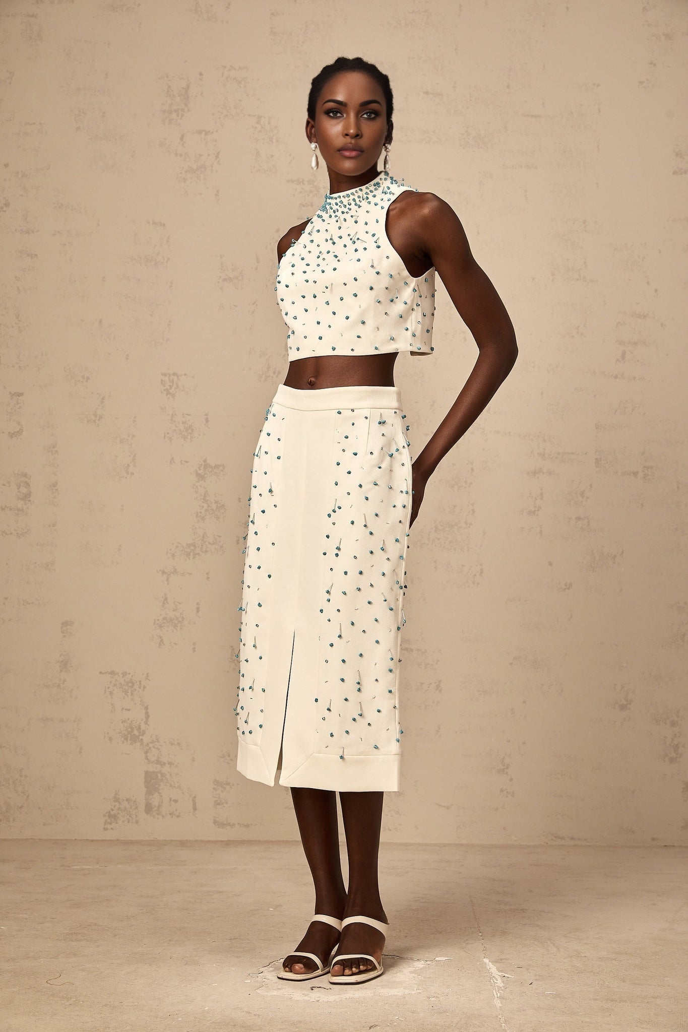 Clothilde matching set featuring an off white embellished top and skirt