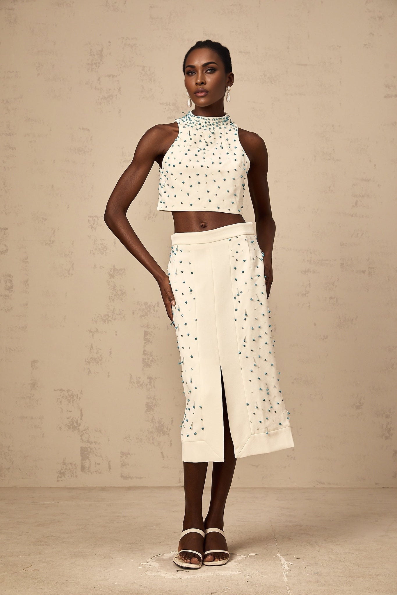 Clothilde off white embellished matching top and skirt set on display