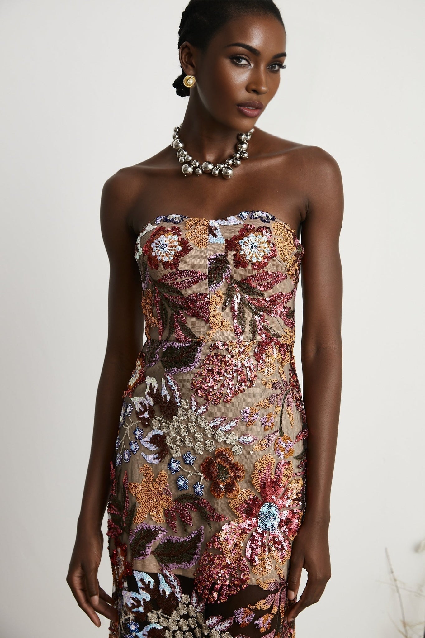 Colorful floral embroidered midi dress adorned with sequins featuring designs by Therese