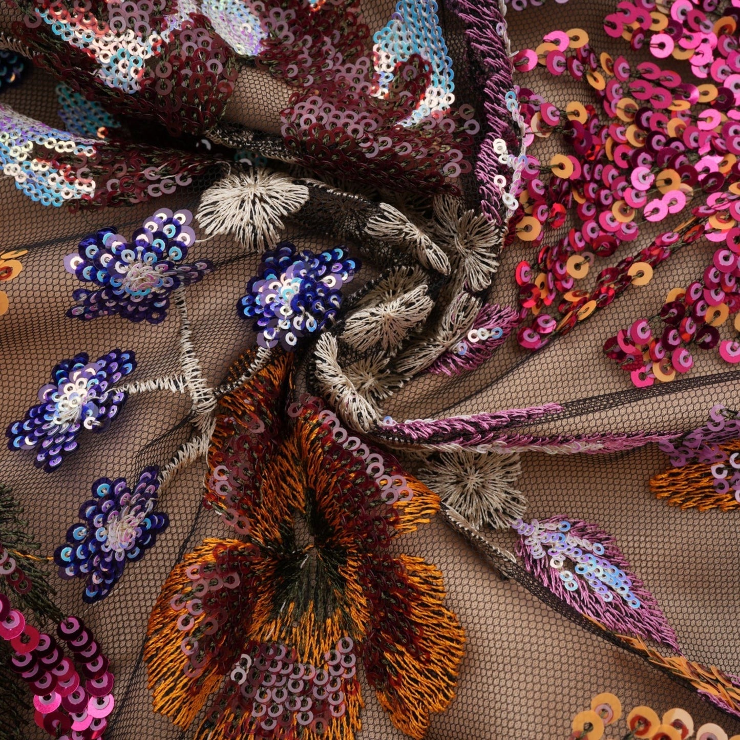 Colorful floral embroidered midi dress with sequin embellishments by Therese