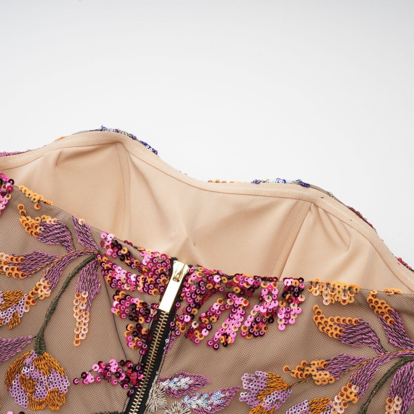 Colorful midi dress with floral embroidery and sequin embellishments by Therese