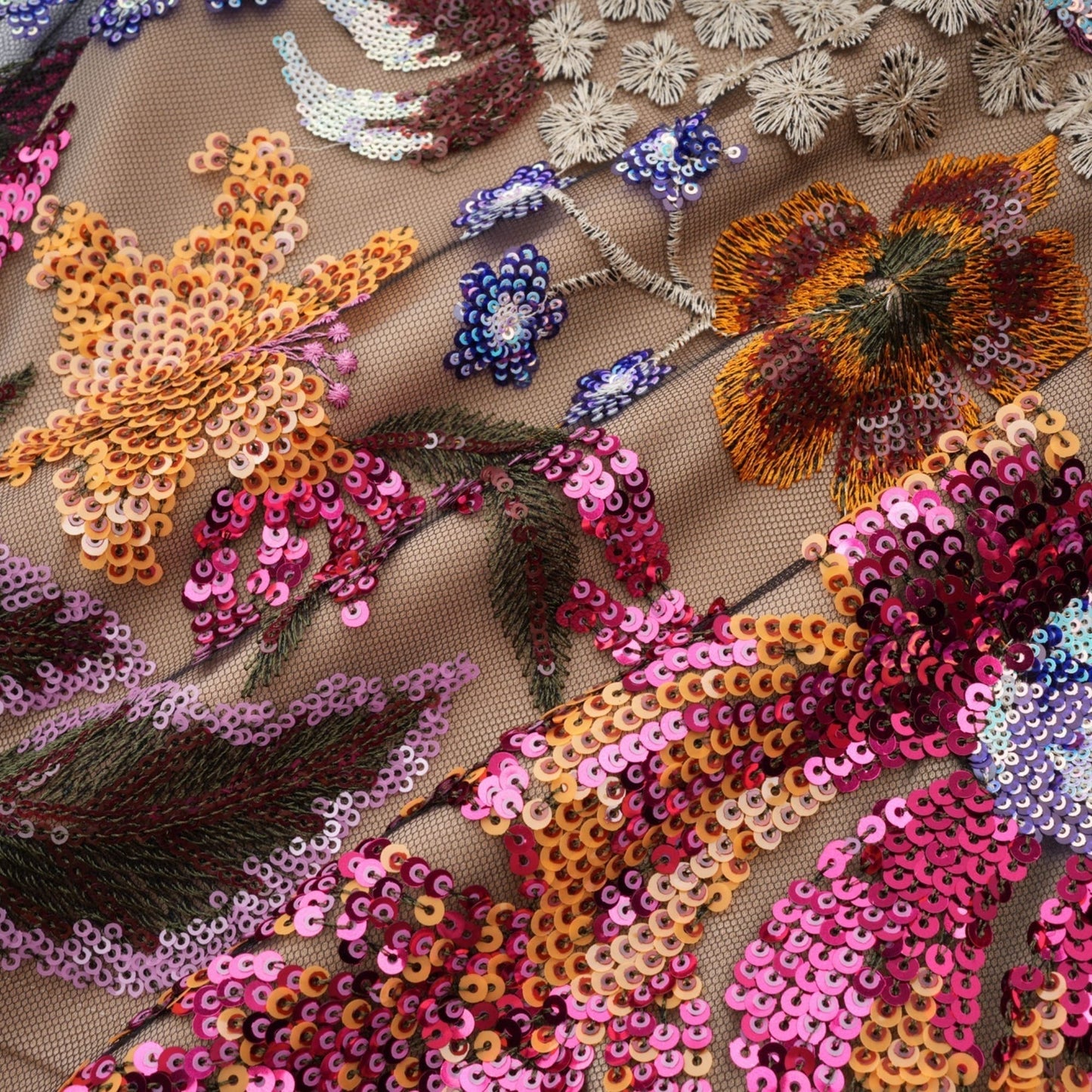 Colorful midi dress with floral embroidery and sequin embellishments by Therese