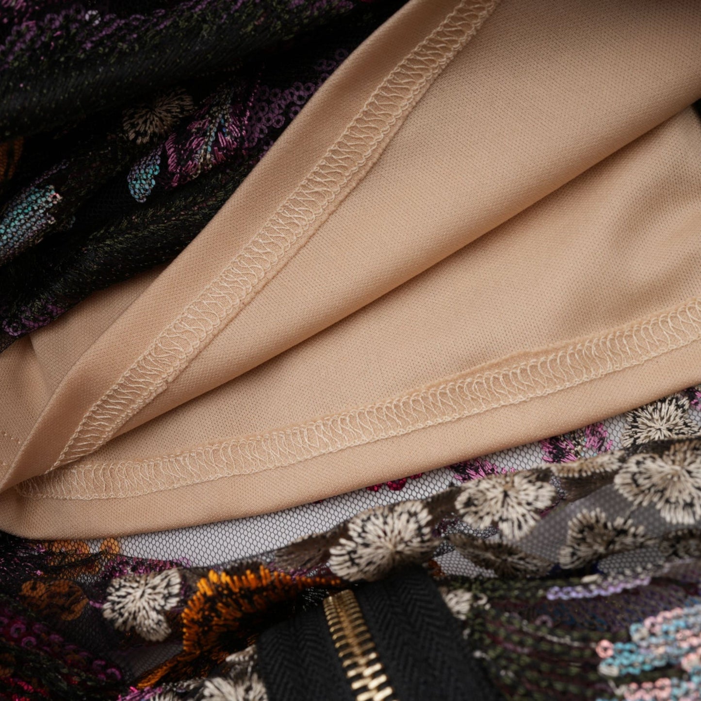 Colorful midi dress with floral embroidery and sequin embellishments by Therese