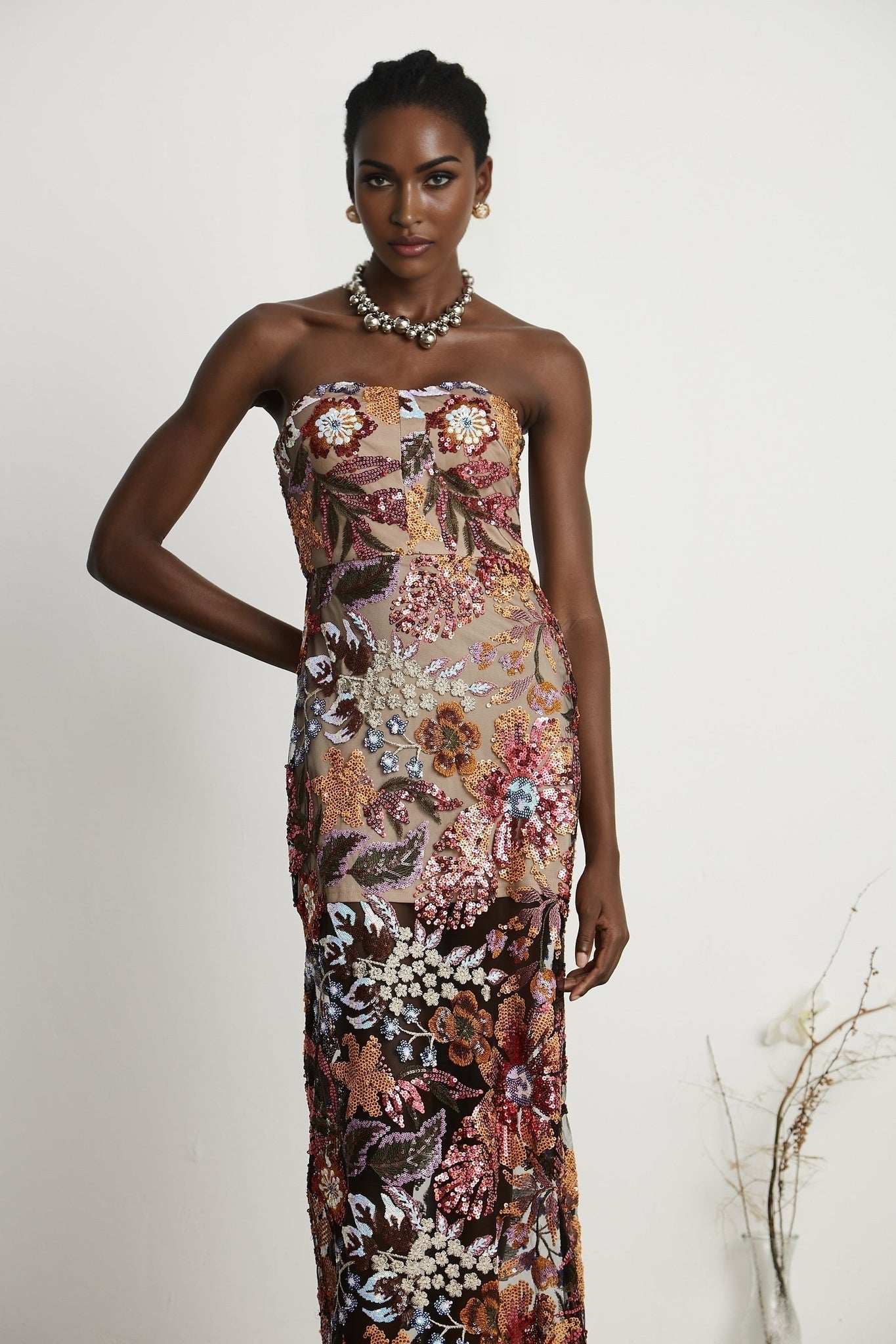 Colorful midi dress with floral embroidery and sequin embellishments by Therese