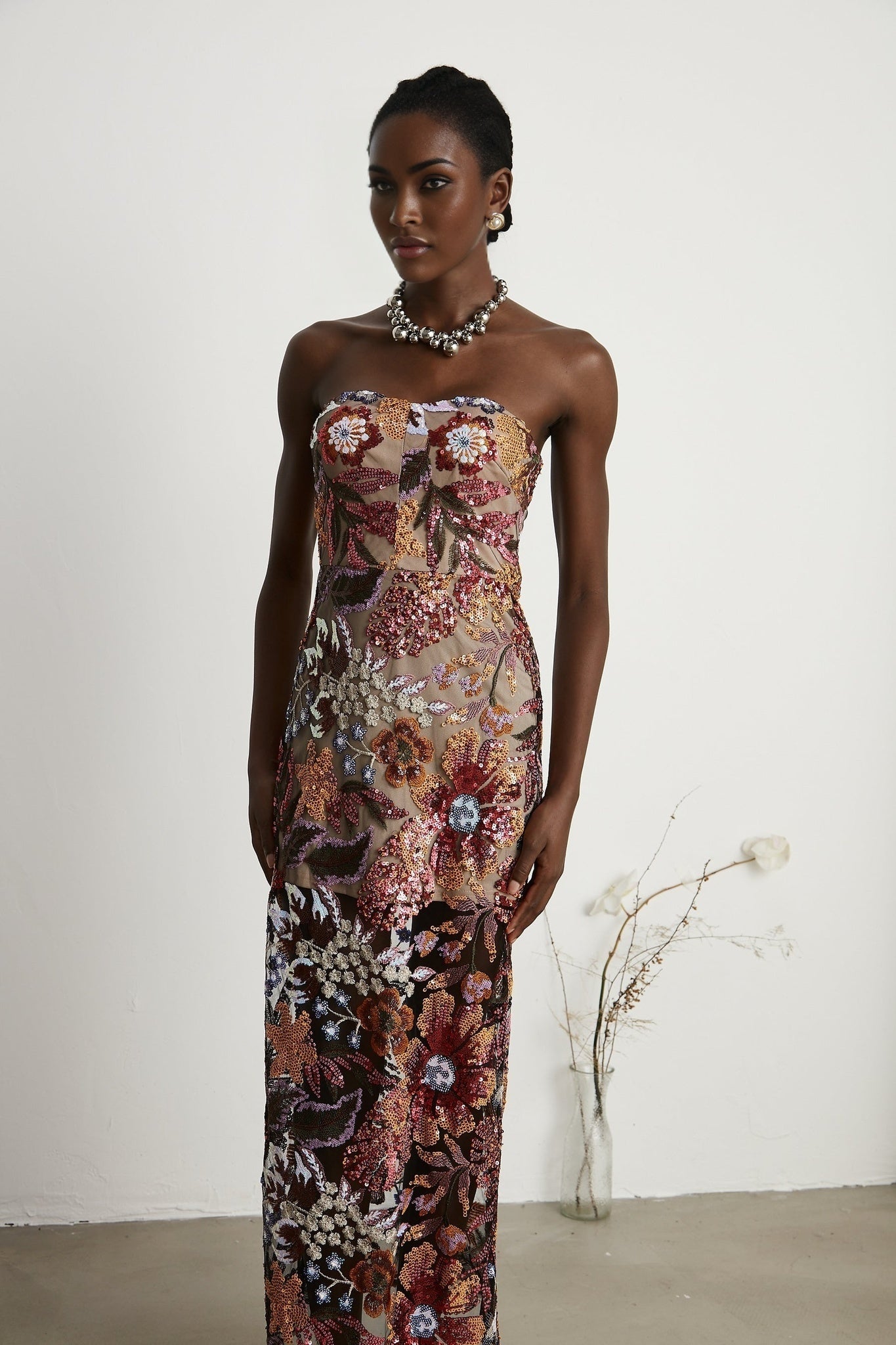 Colorful midi dress with floral embroidery and sequin embellishments by Therese