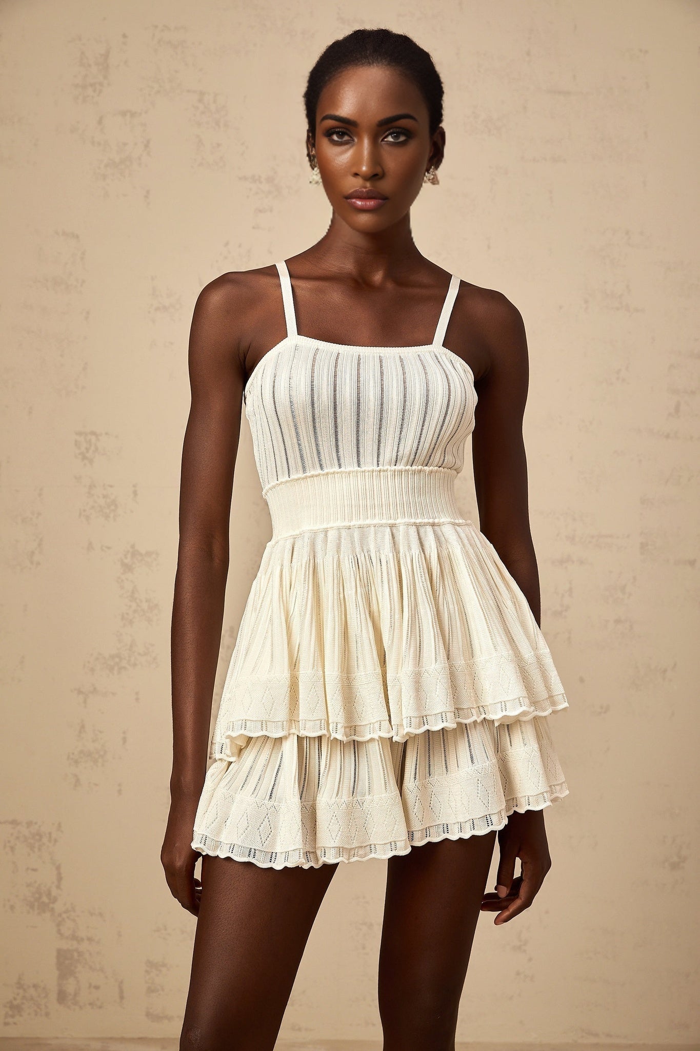 Cream colored matching set with a shirred crochet knit top and culottes Oriane design