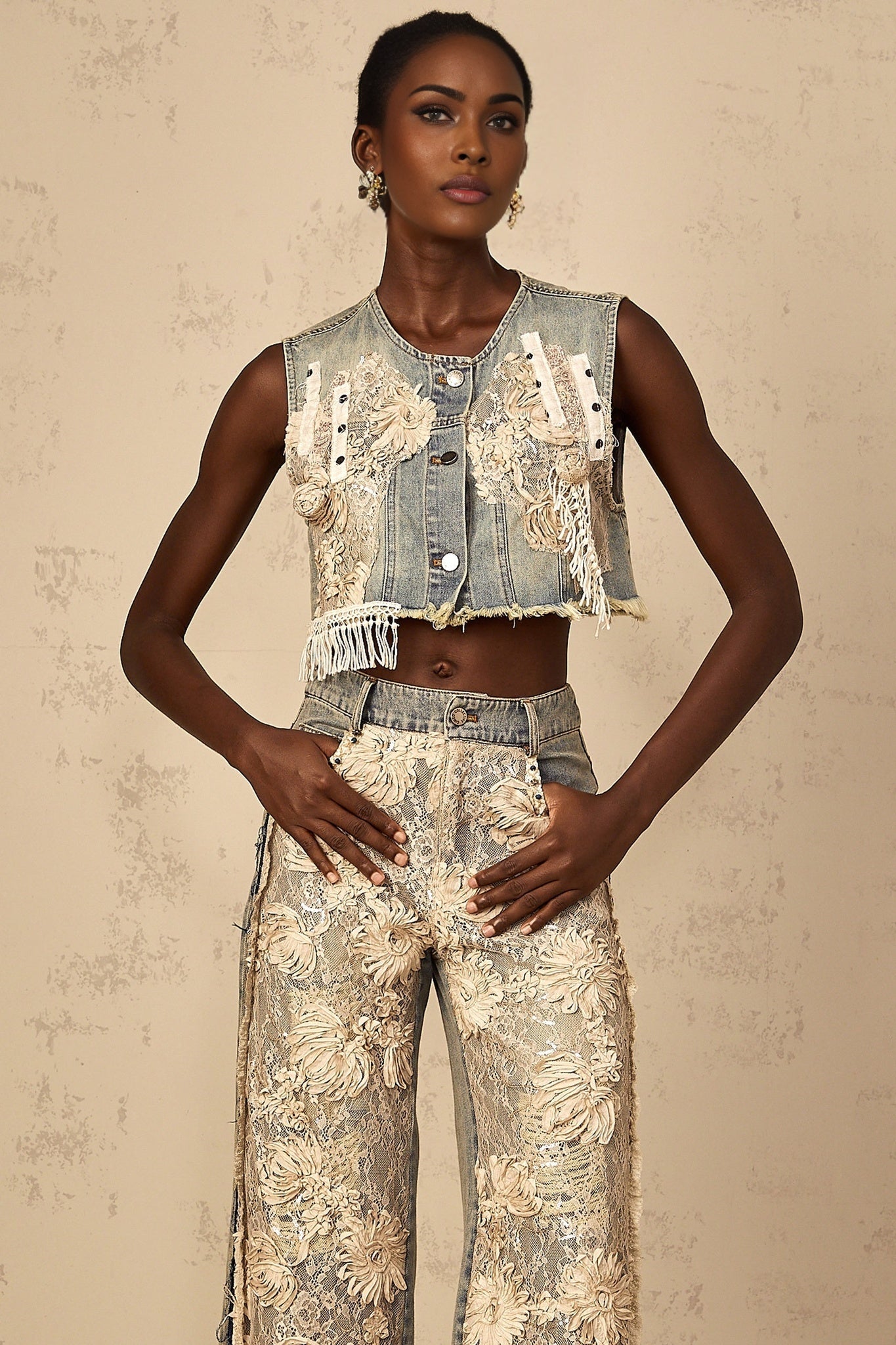 Cropped light blue denim top with lace panels and short sleeves