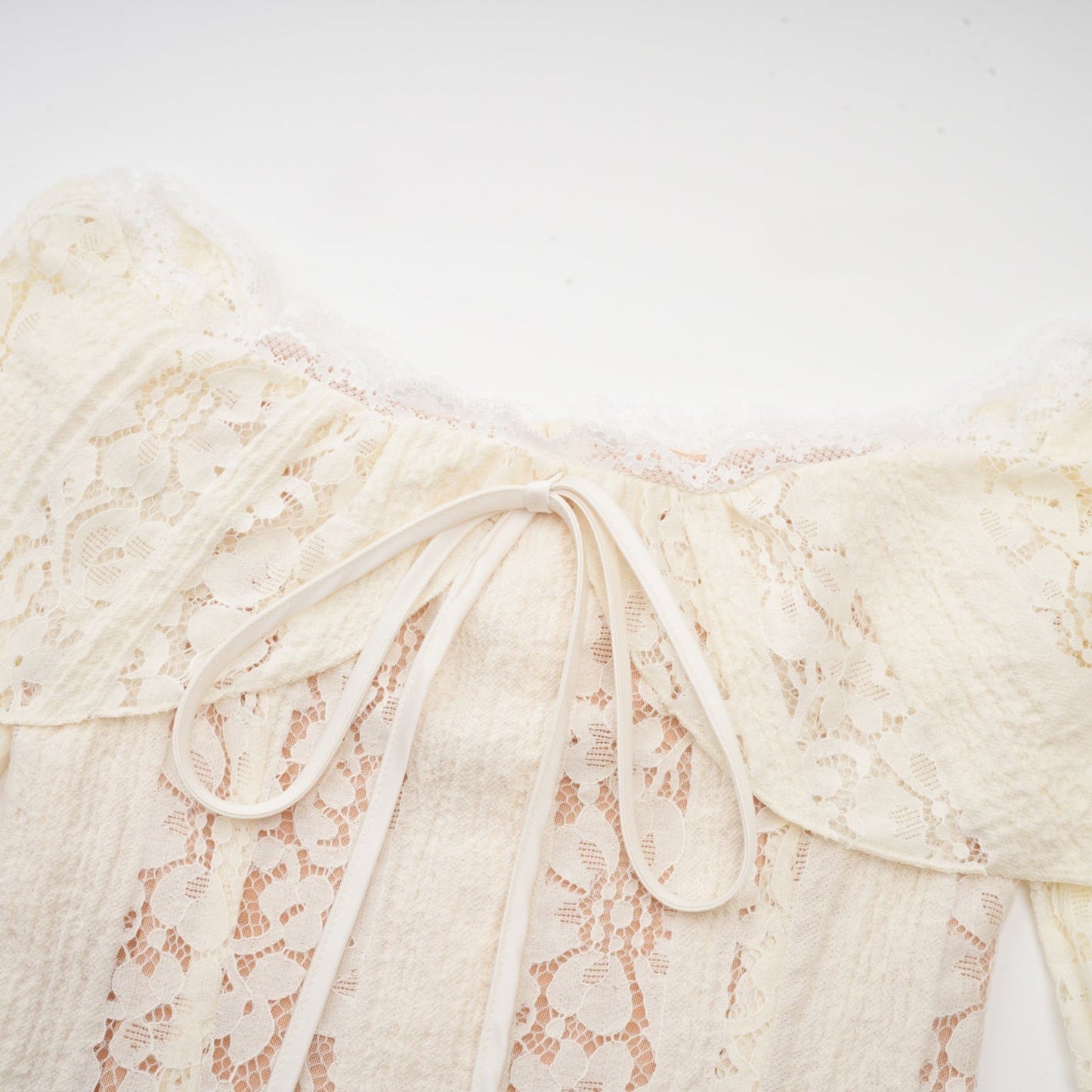 Émeline floral lace flaredcuff mini dress in Neutrals