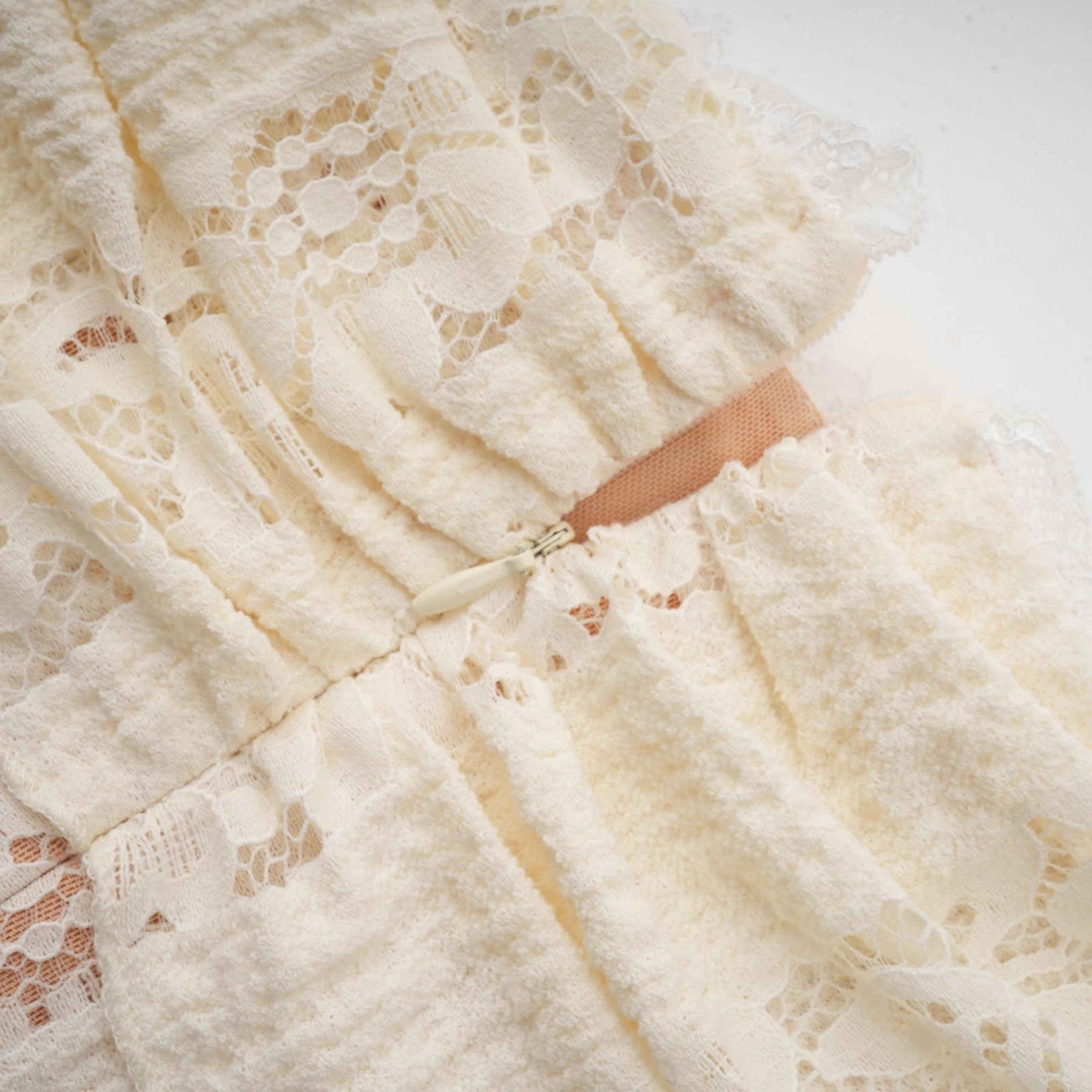 Émeline floral lace flaredcuff mini dress in Neutrals