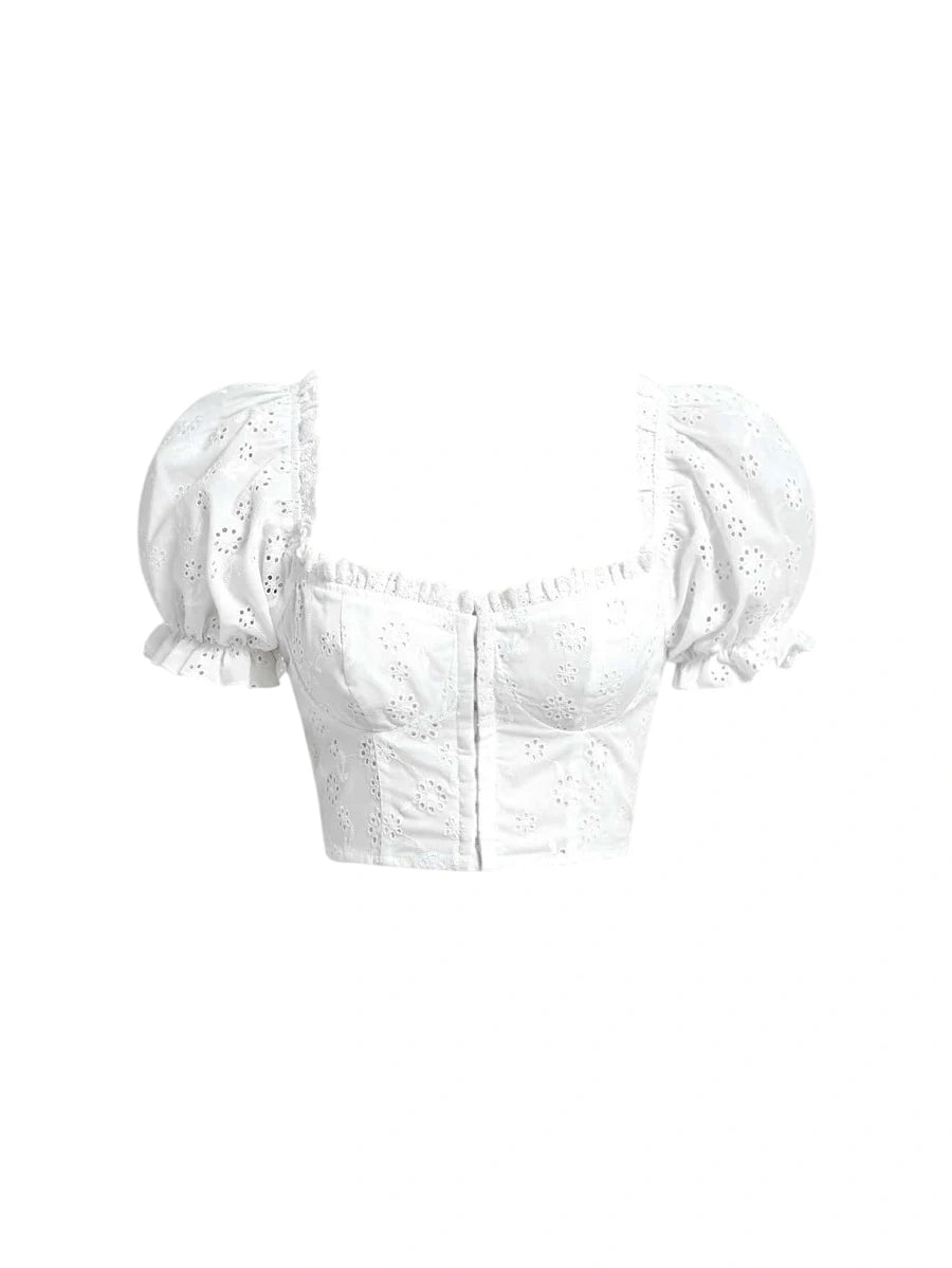 Clara eyelet puff sleeve blouse with embroidered details, button-up front, and vintage-inspired design