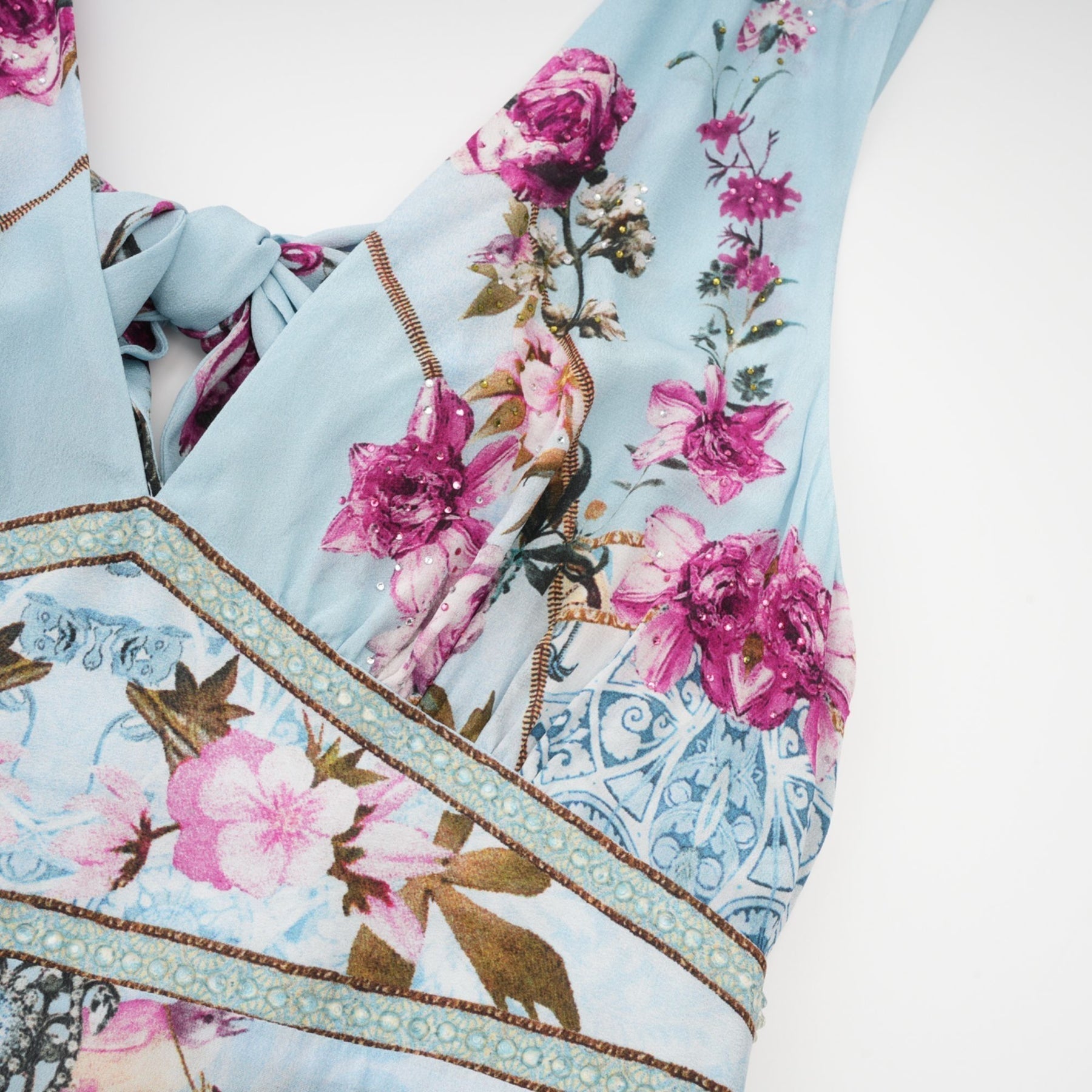 Floral print midi dress named Victoire featuring a colorful flower pattern on a light background