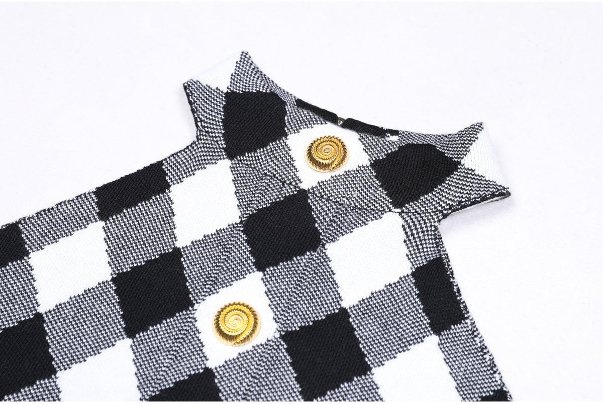 Form-fitting black and white plaid halter top with gold buttons