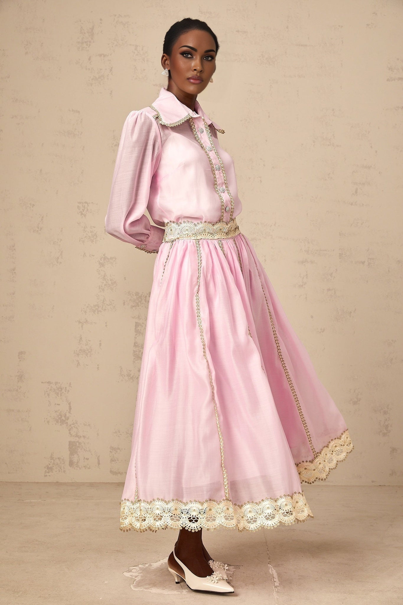 Frida pink matching set with lace trim shirt and skirt on white background