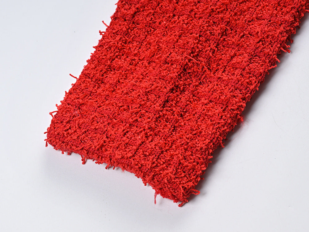 Elegant red tweed jacket with gold embellishments paired with a matching midi skirt, ideal for formal occasions
