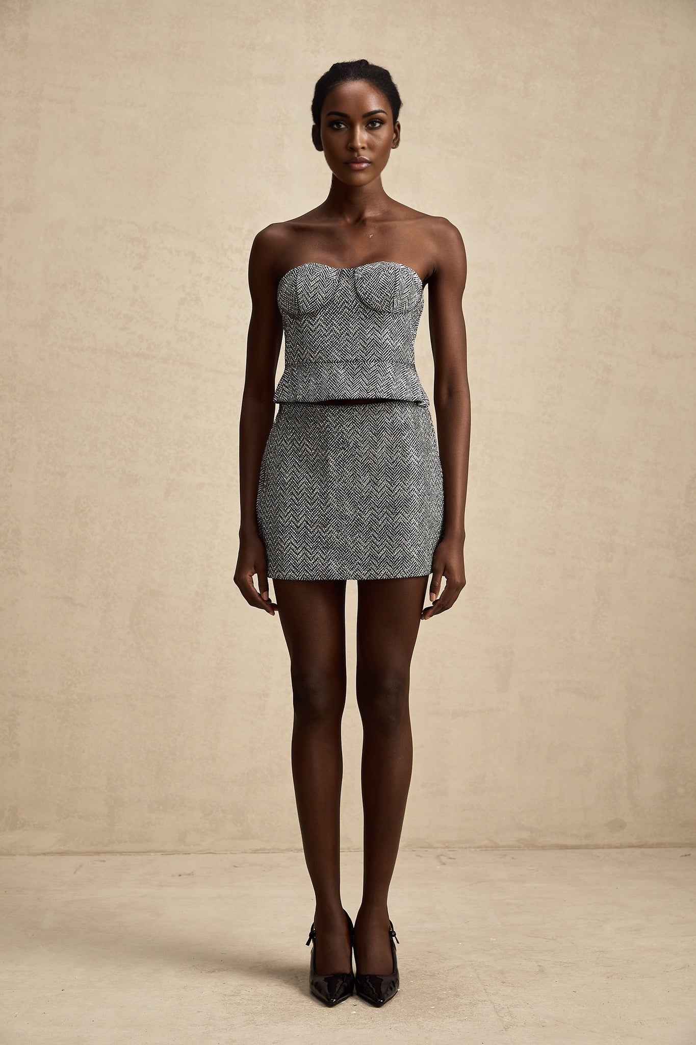 Gray corset top with herringbone pattern named Chantal