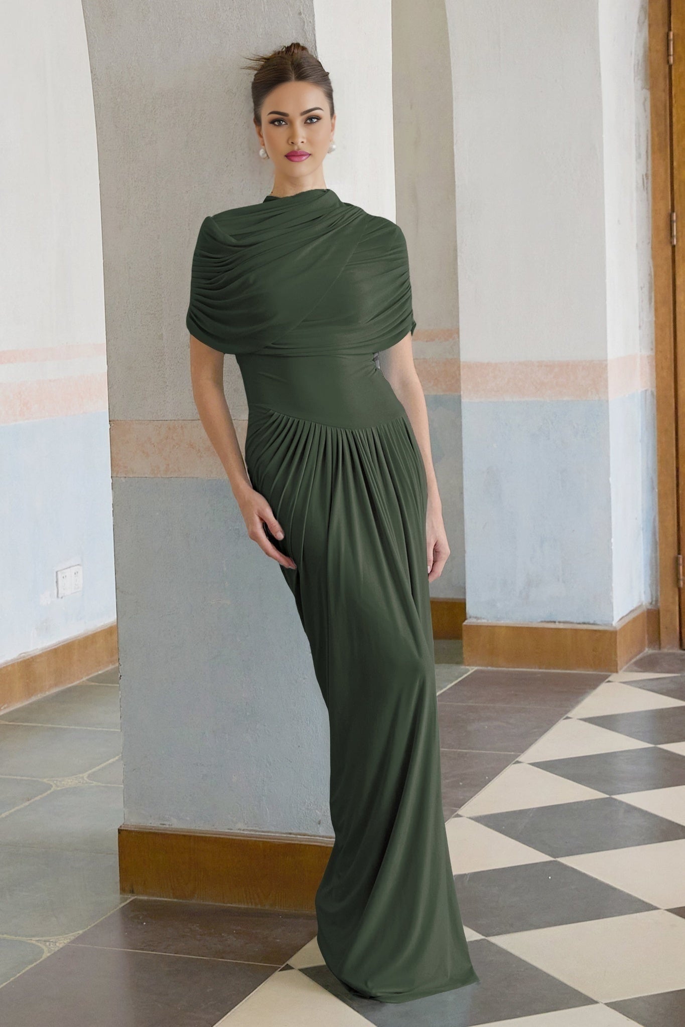 Green asymmetric pleated maxi dress named Catherine on a plain background