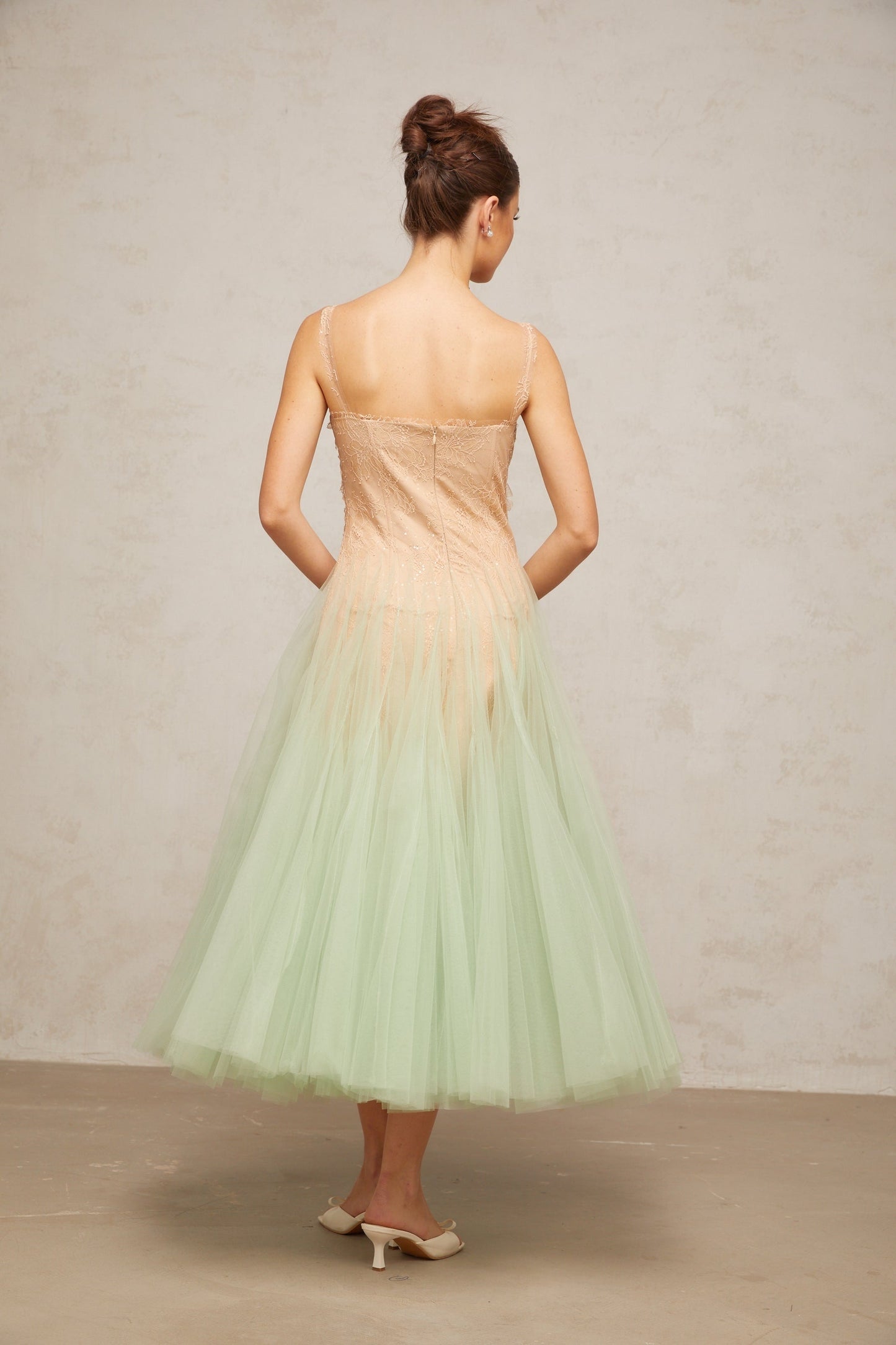 Green midi dress with lace panels and tulle skirt