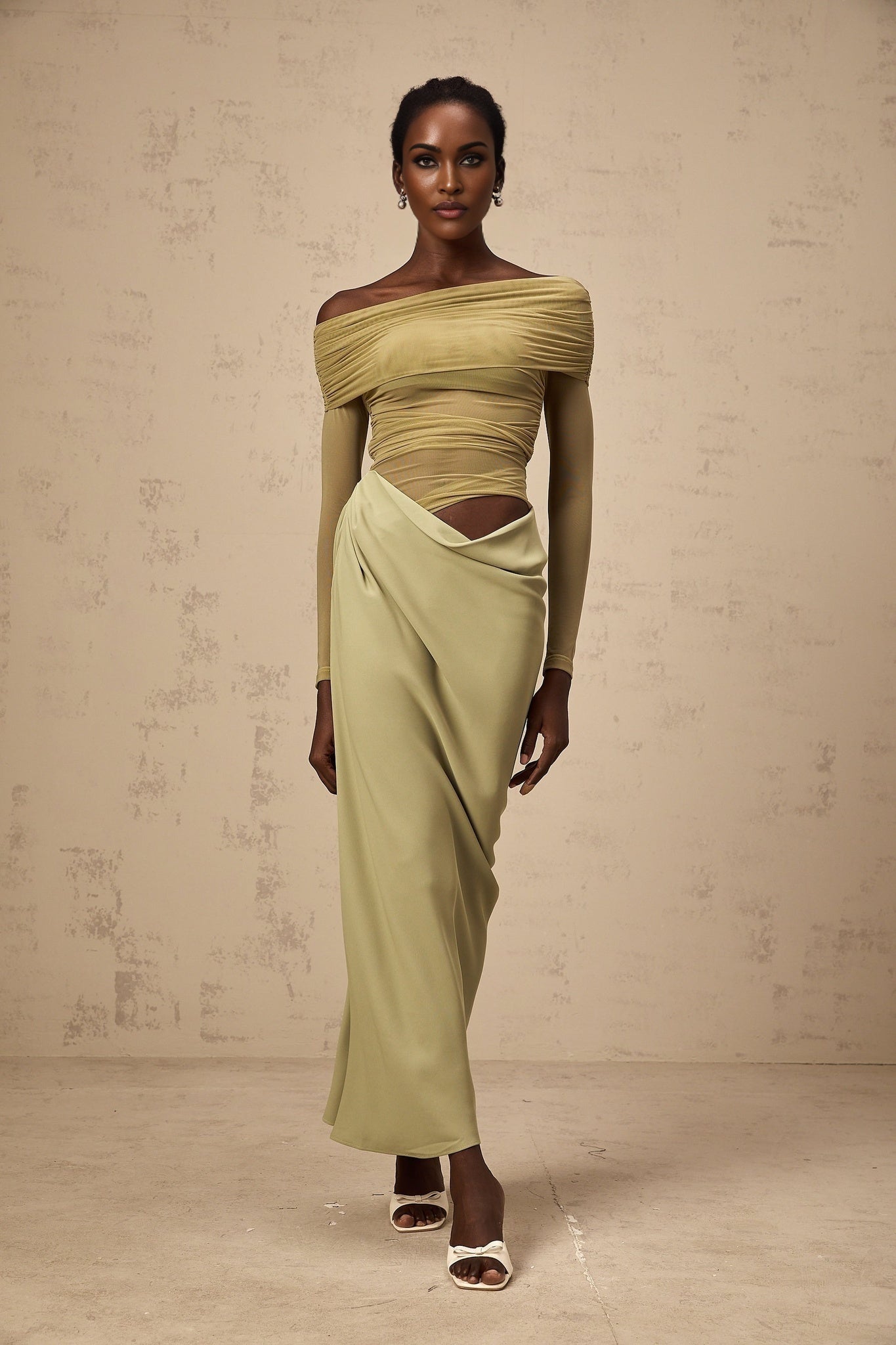 Green off shoulder midi dress with semi sheer fabric and flowy design