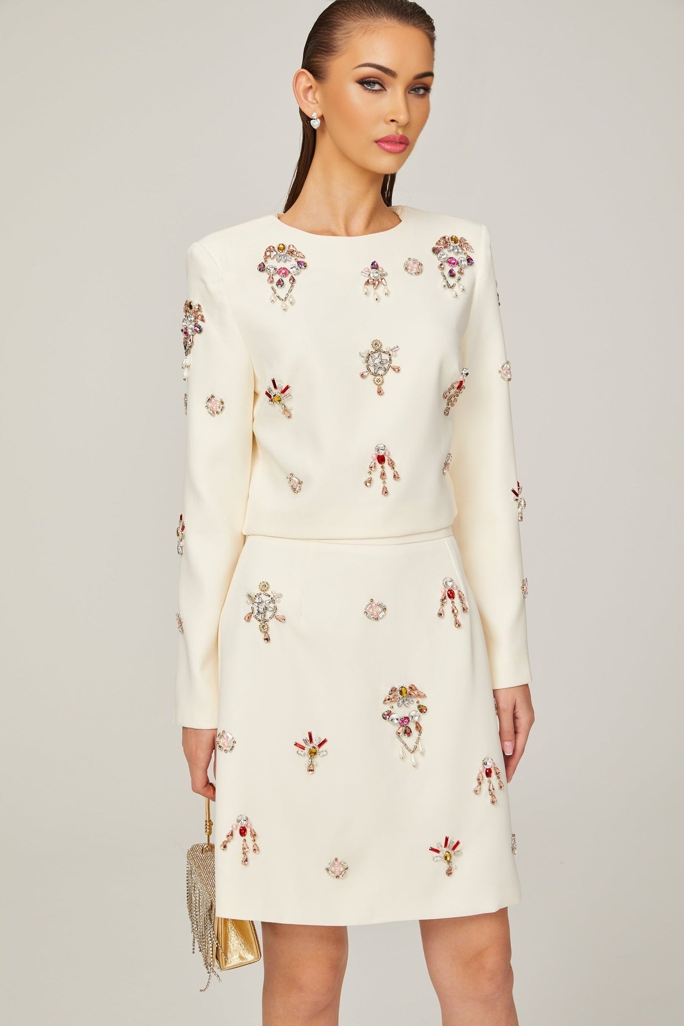 Jeanne white crystalembellished top skirt matching set