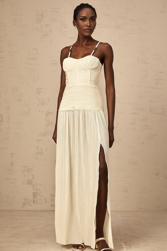 Long neutral colored pleated maxi dress with side slit and Felicie style