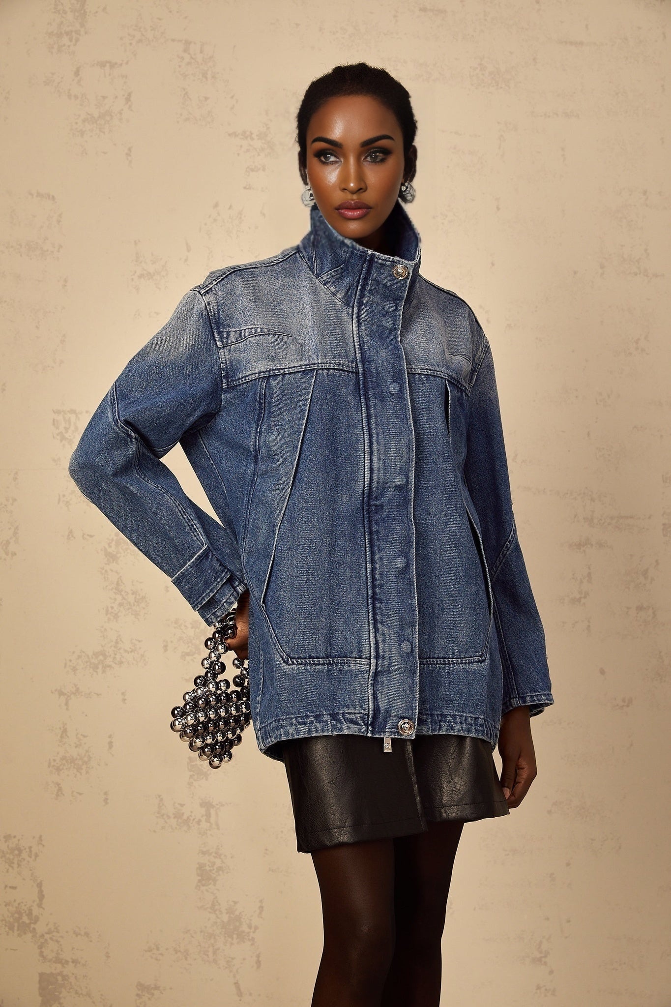 Loose fitting blue denim jacket with patchwork design named Geraldine