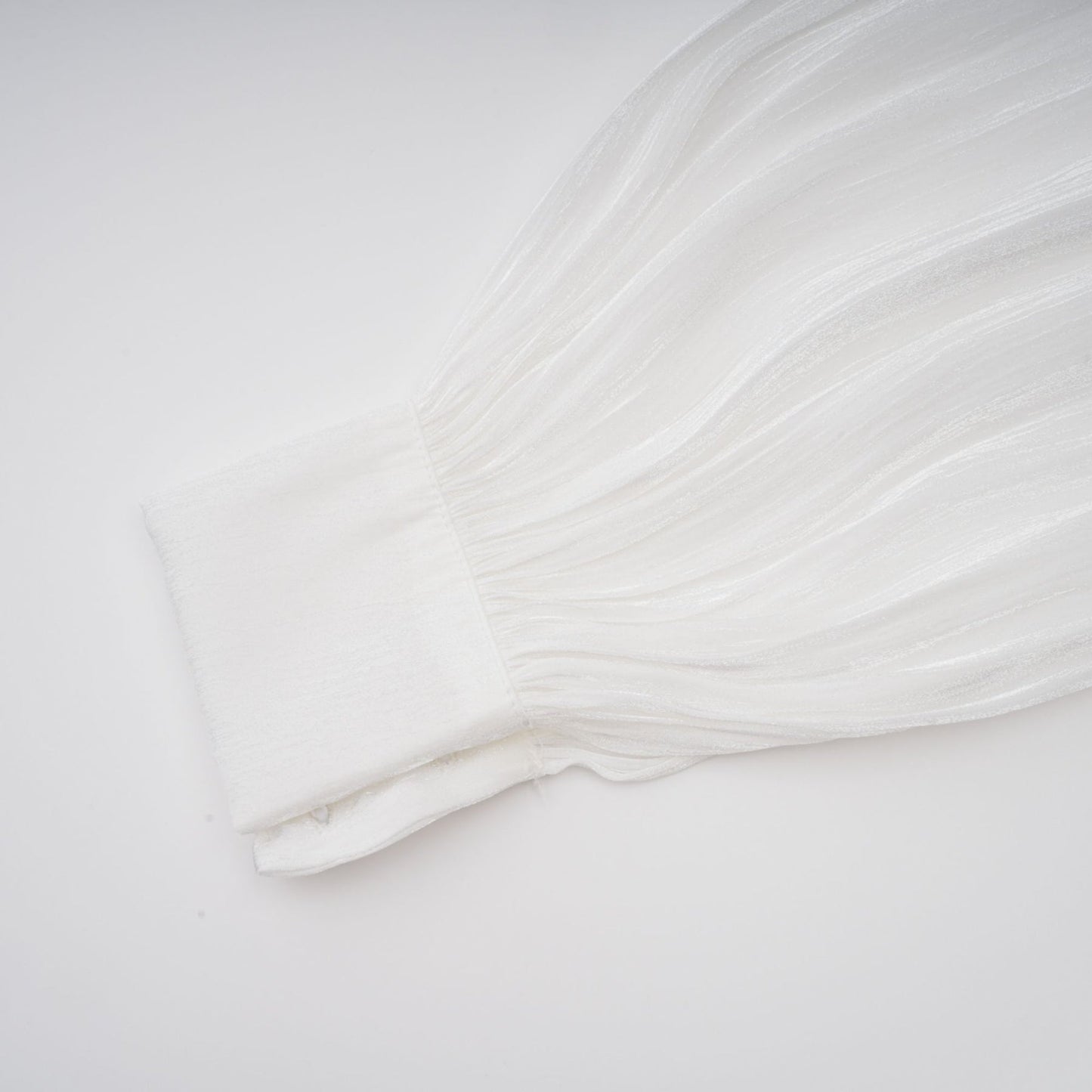 Mahault white pleated glittereffect mini dress