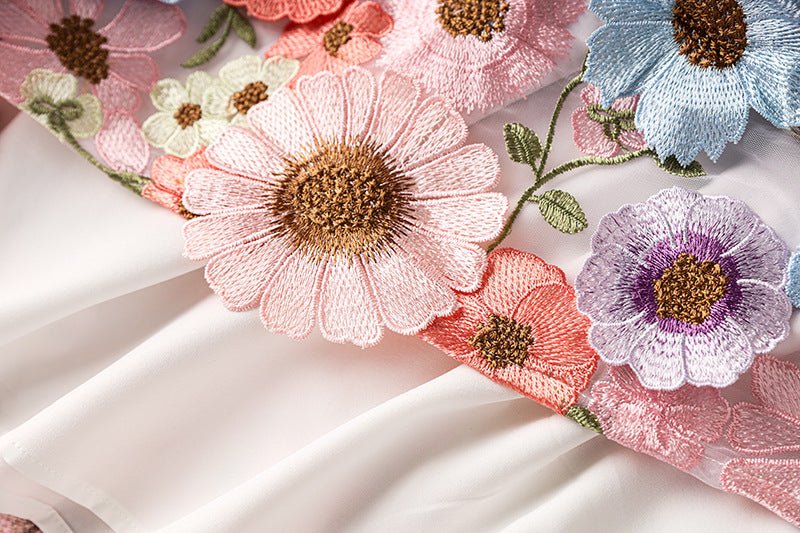 Multicolored floral embroidered A-line skirt with high-waist in soft pastel palette and vibrant accents