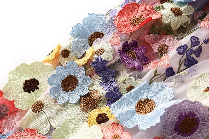 Multicolored floral embroidered A-line skirt in soft pastel palette with vibrant accents