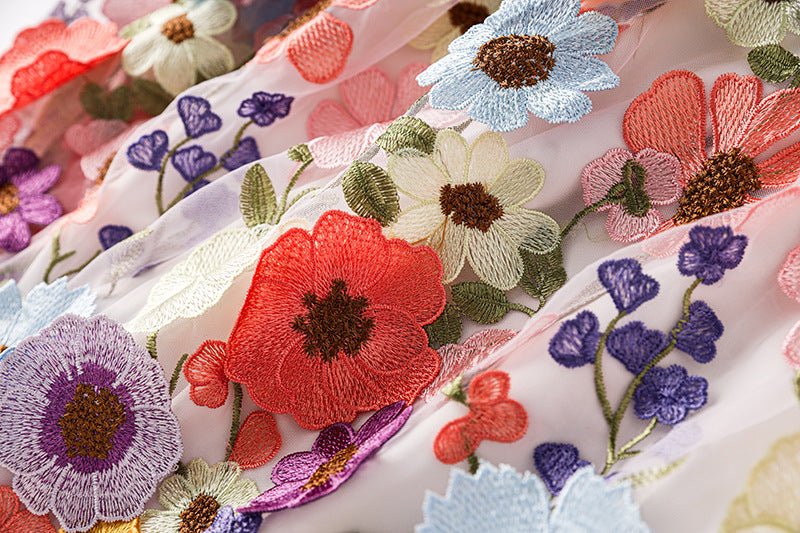 Multicolored floral embroidered A-line skirt in soft pastel palette with vibrant accents