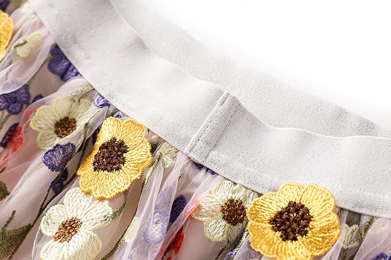 Multicolored floral embroidery A-line skirt in soft pastel palette with vibrant accents