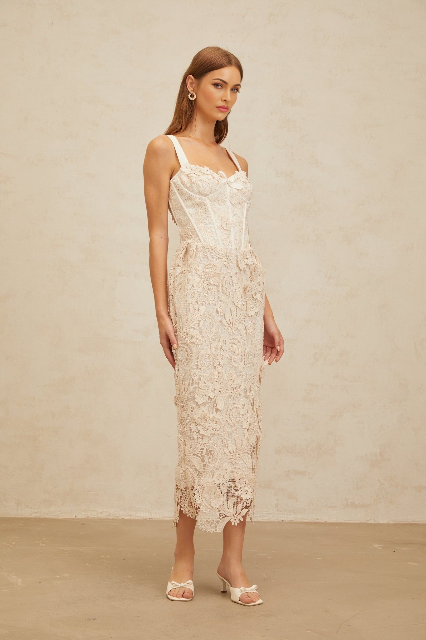 Neutrals corset style midi dress with sweetheart neckline and bow embellishment