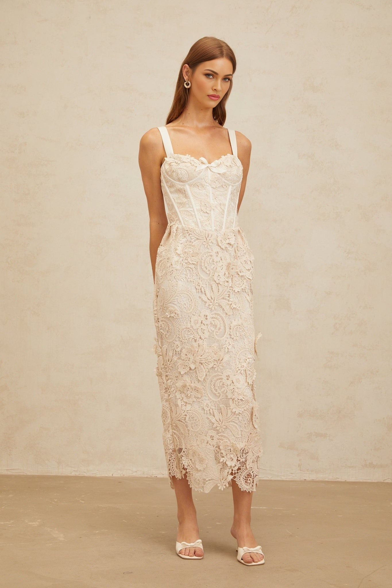 Neutrals sweetheart neckline corset style midi dress with bow embellishment