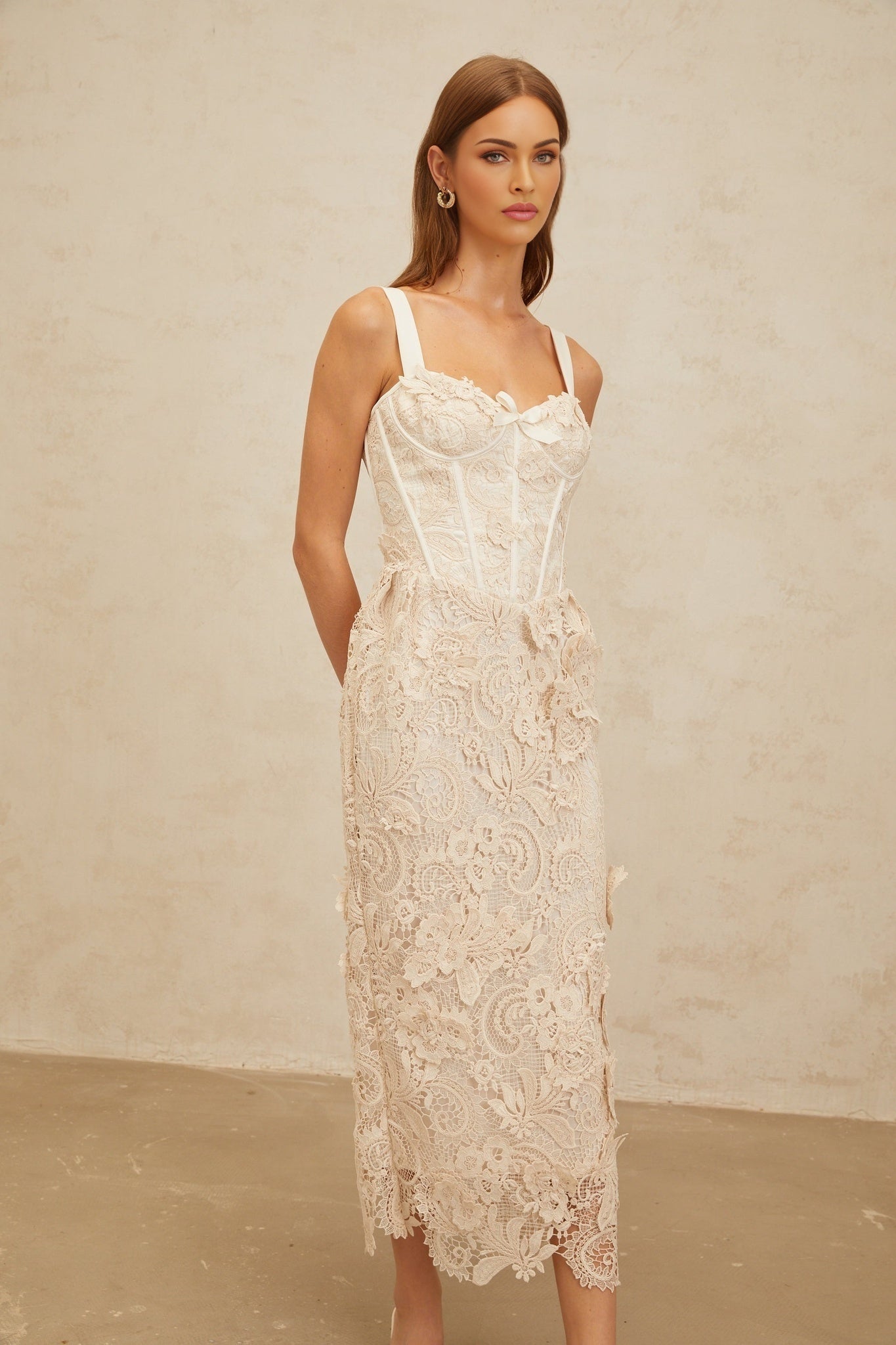 Neutrals sweetheart neckline corset style midi dress with bow embellishment