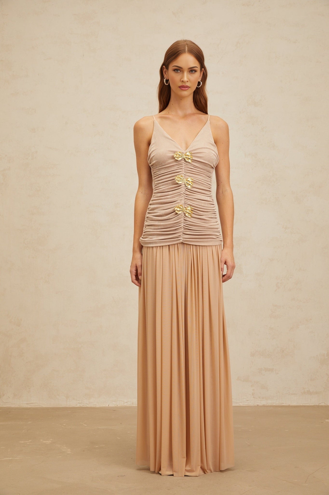 Neutrals V-neck sleeveless top and pleated maxi skirt in Terylene fiber