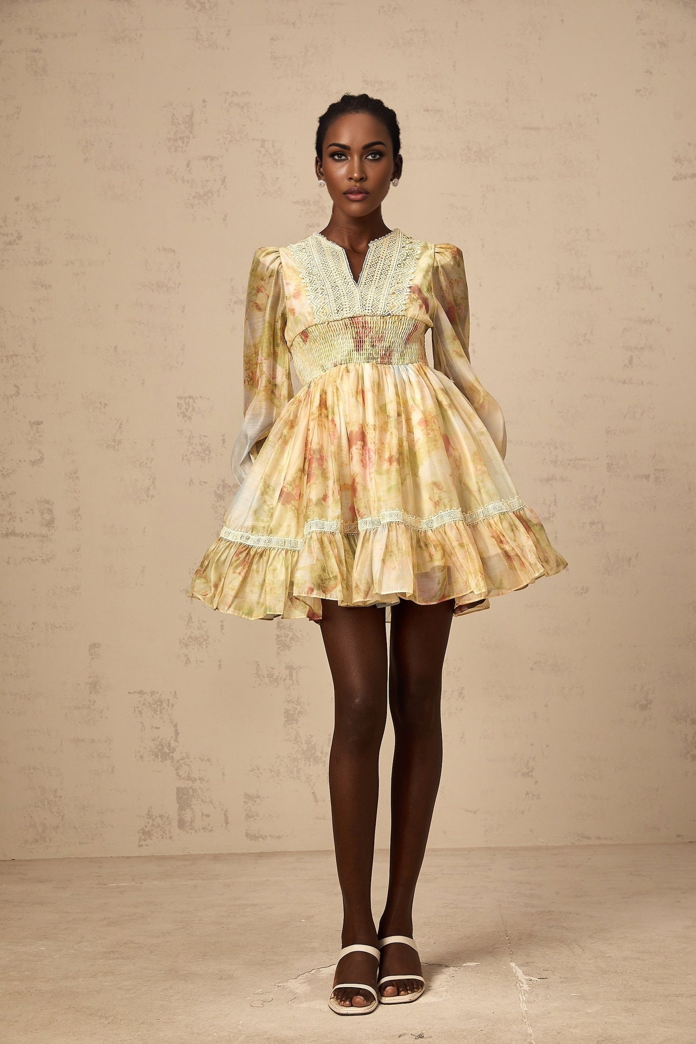 Olivia yellow mini dress with lace panels and floral print pattern