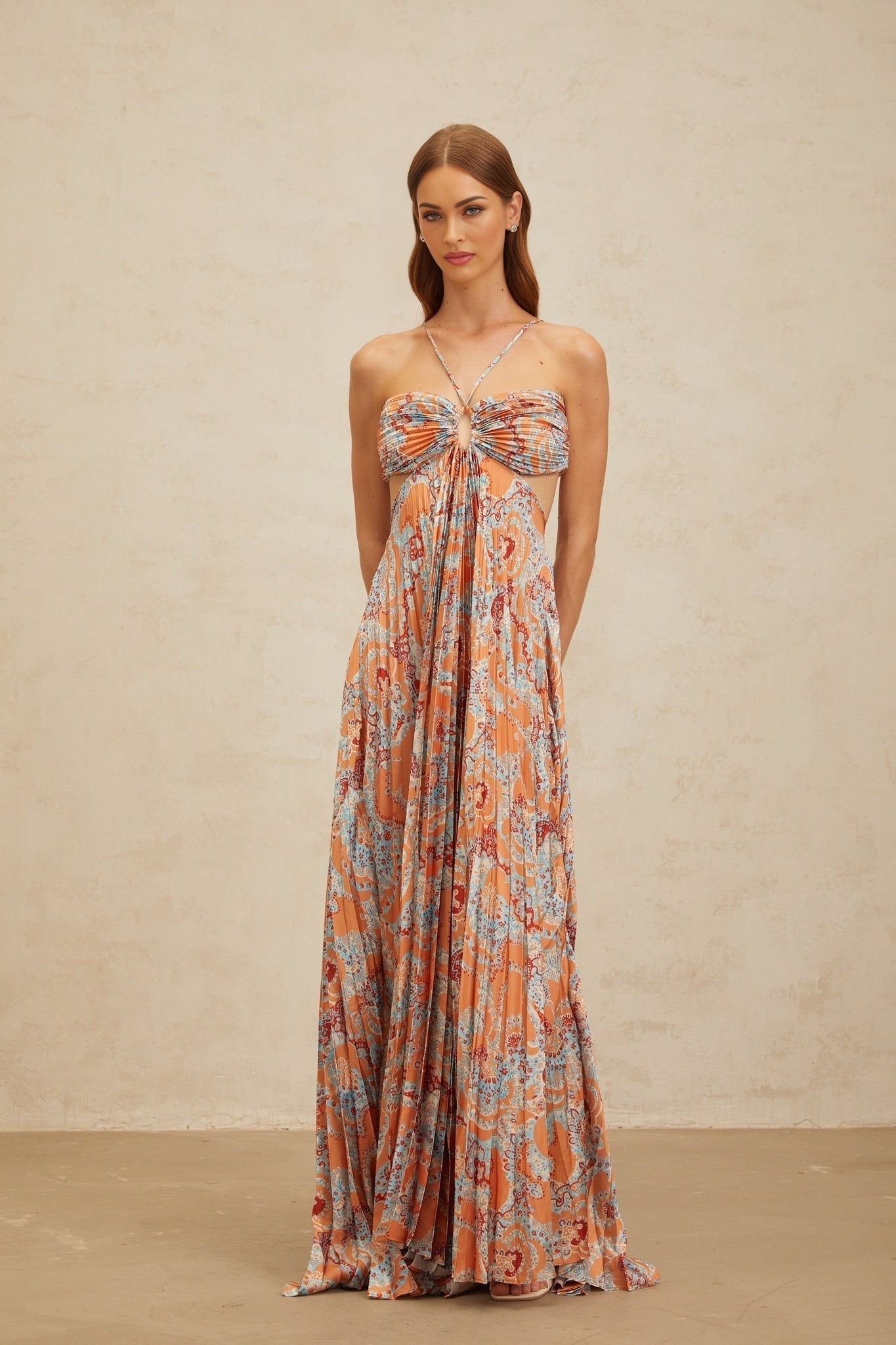 Orange floral print halterneck maxi dress with cut-out design and bustier style