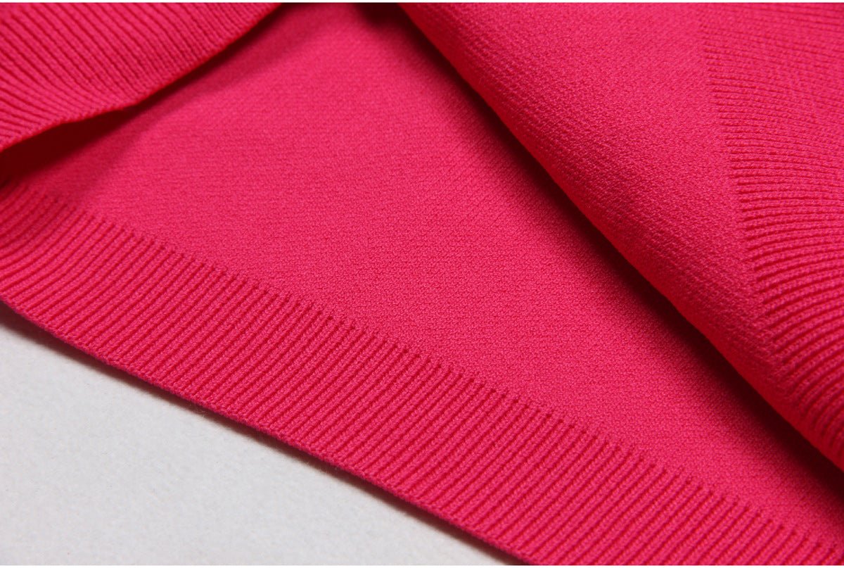 Bold pink geometric patterned cutout dress with metallic accents