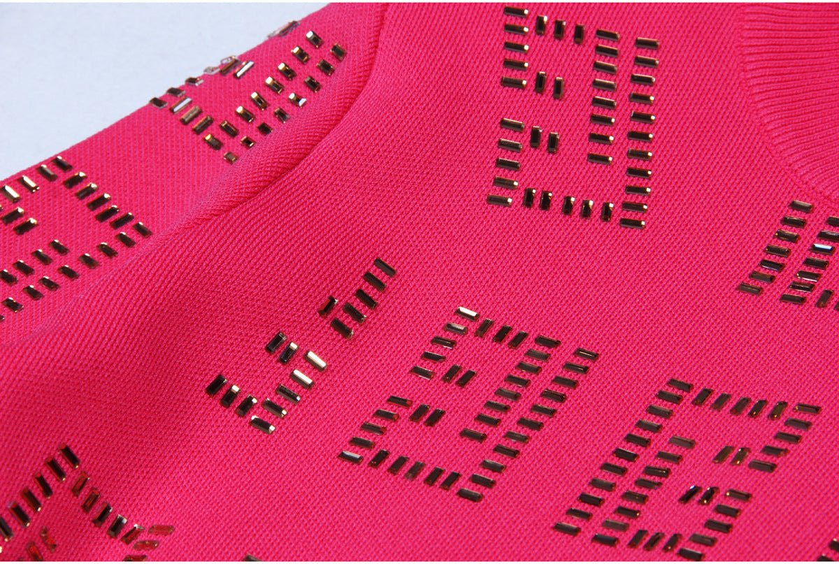 Pink geometric patterned cutout dress with metallic accents
