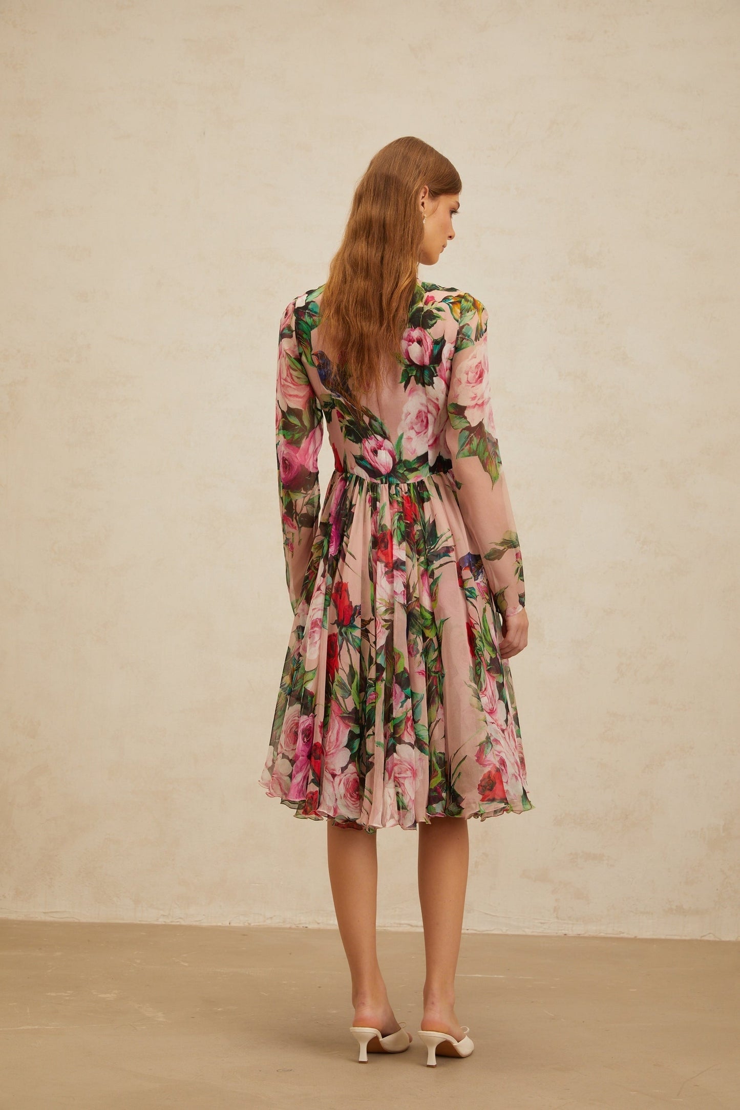 Pink long sleeve silk dress with rose print and shirred panel