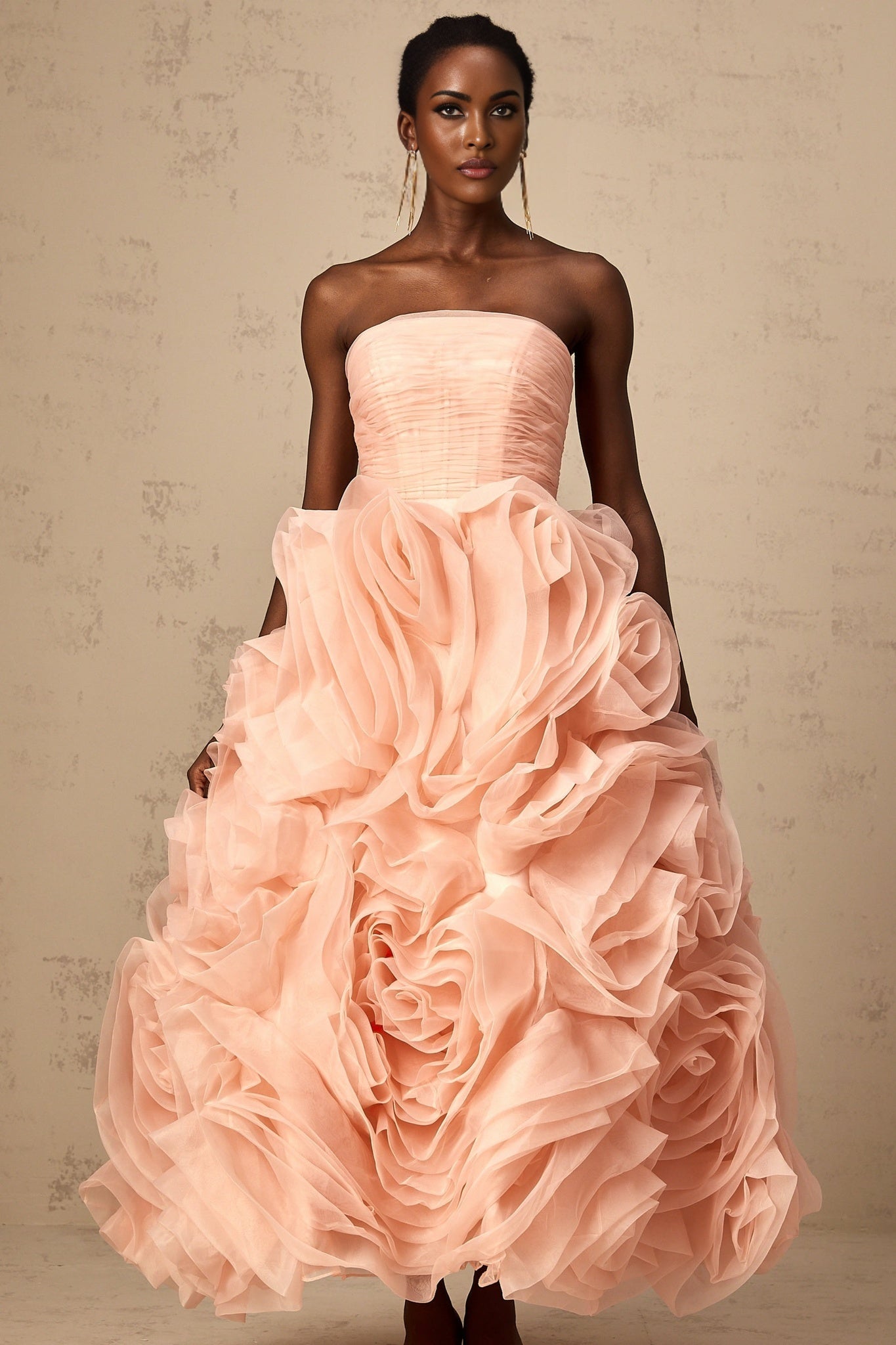 Pink off shoulder midi dress with 3D tulle petal details and a feminine silhouette