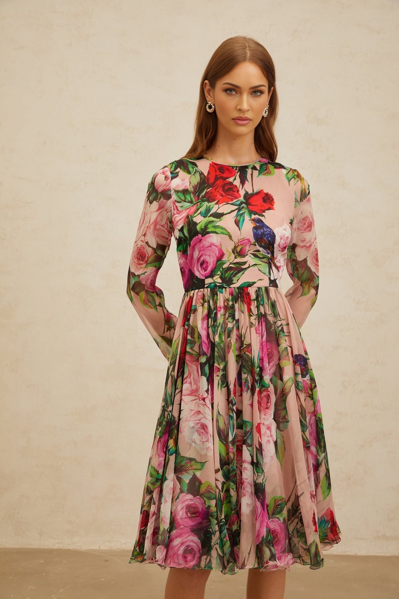 Pink silk rose print midi dress with long sleeves and shirred panel