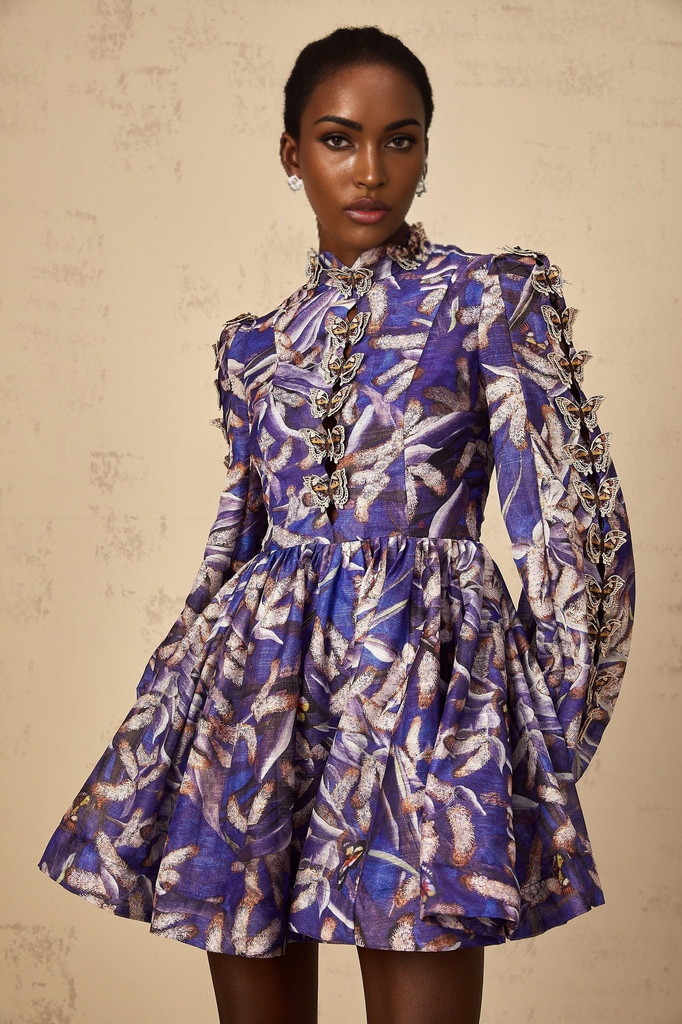 Purple mini dress with butterfly applique details named Fiona