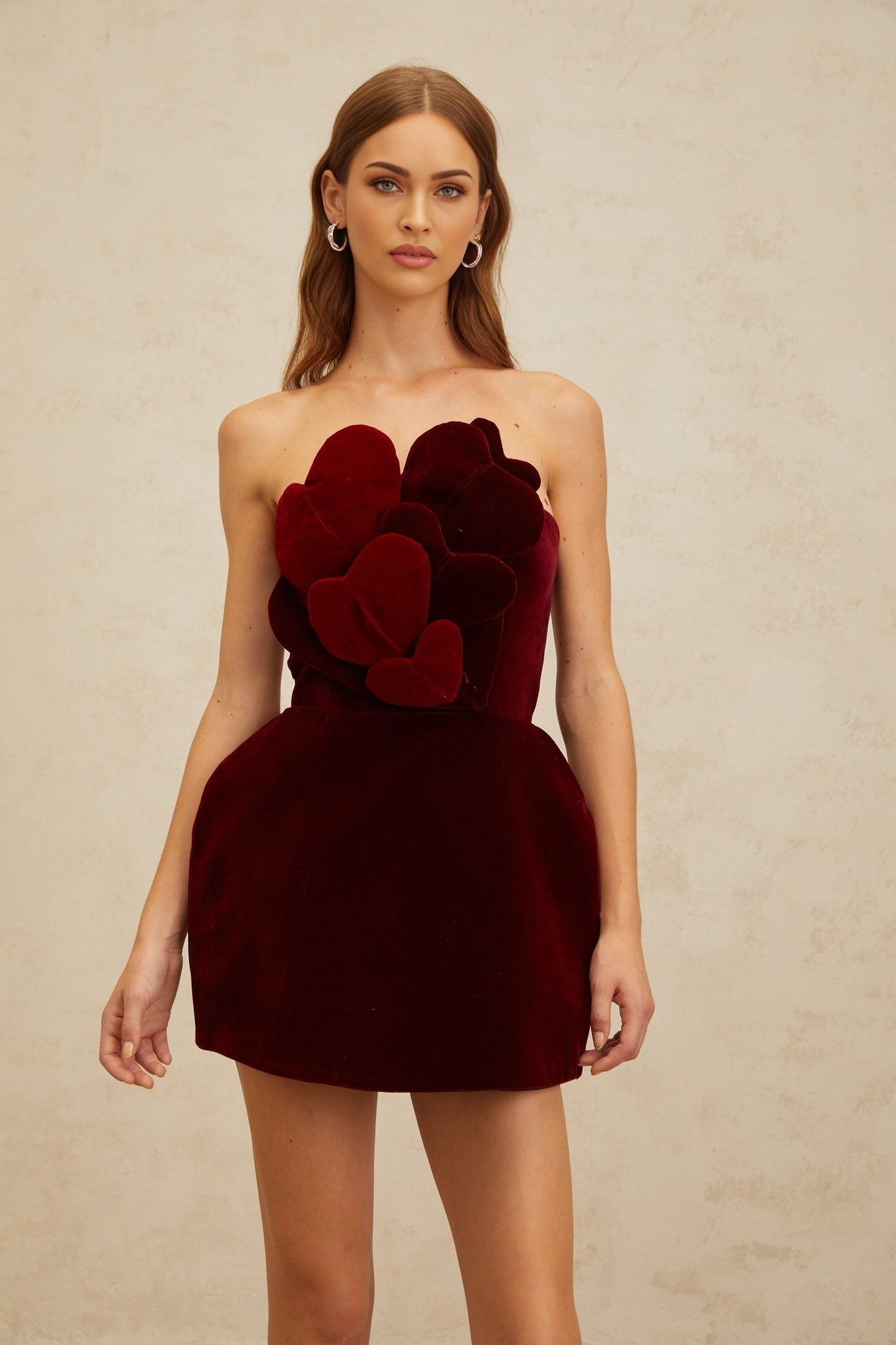 Red velvet off the shoulder dress with 3D-heart motif and puff skirt