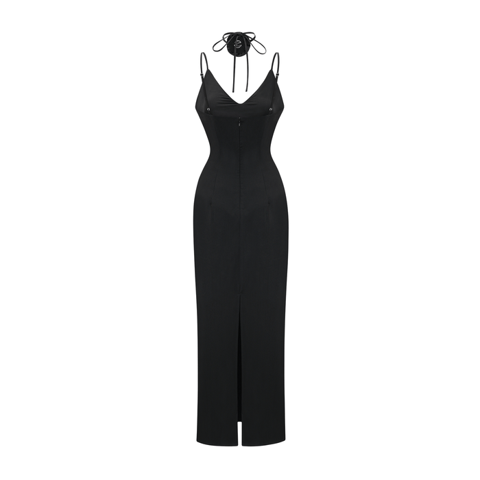 Black anklelength dress with spaghetti straps flower decoration at the neck open back and made of 100% polyester