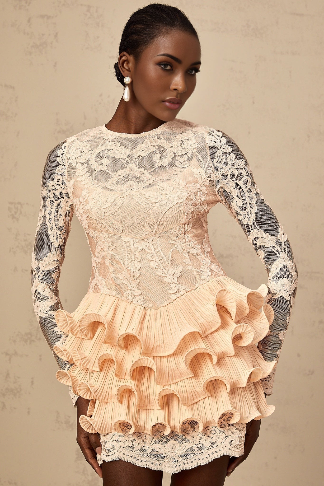 Short floral lace mini dress with tiered skirt and lace paneling details