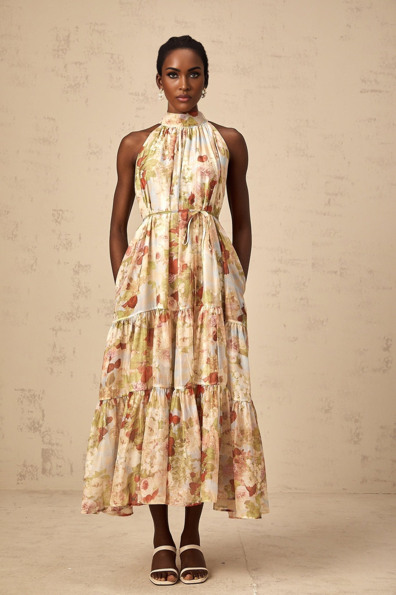 Sleeveless floral midi dress in neutral colors with Ulani design