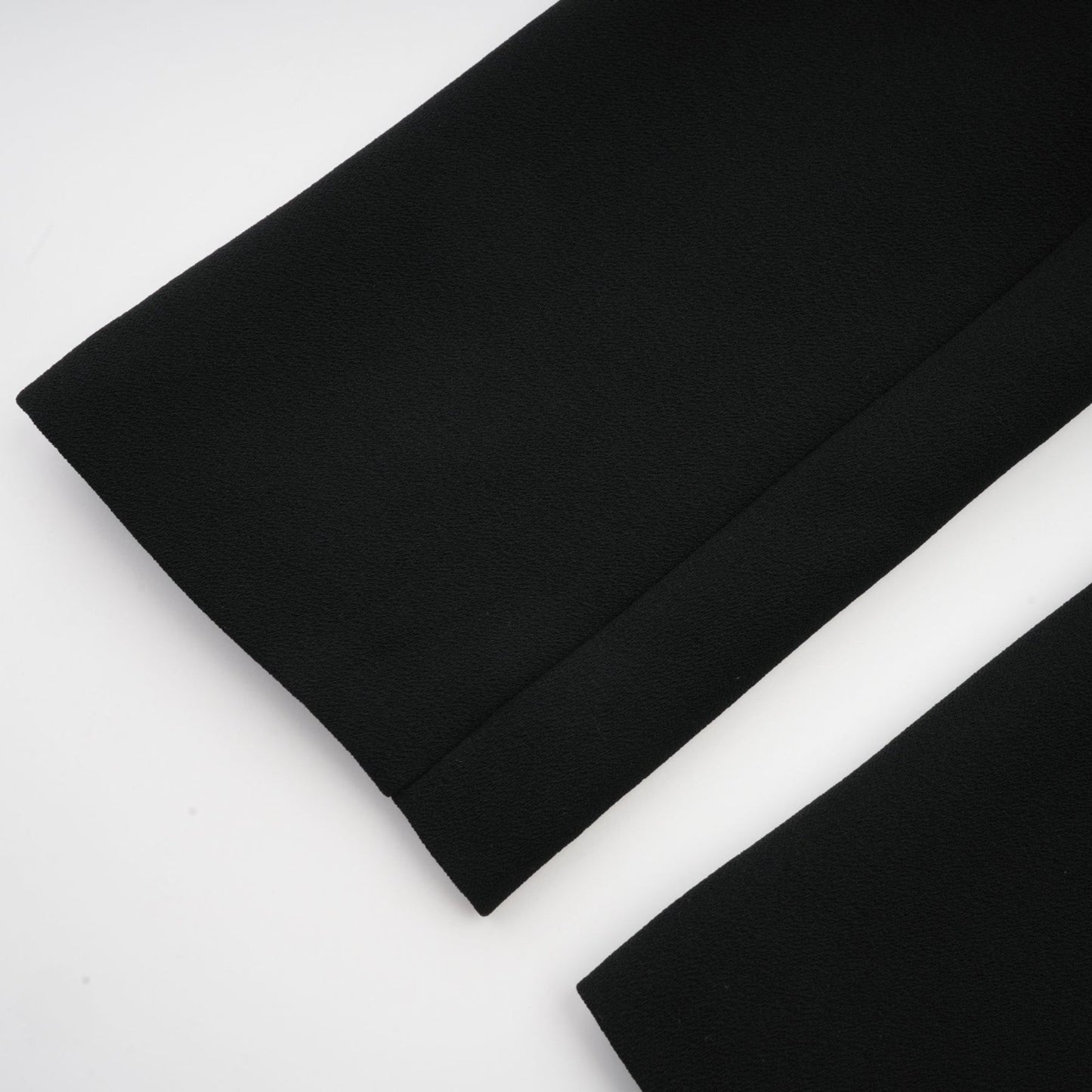 Suzanne black pleated jacket trousers matching set