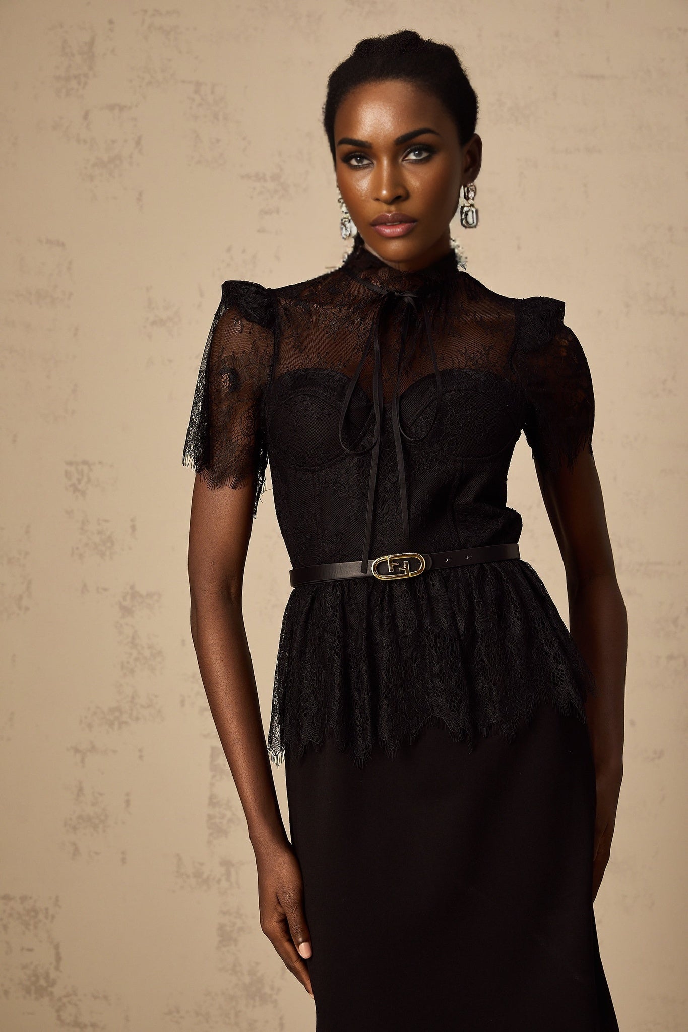 Thérèse black midi dress with guipure lace panels shown without belt