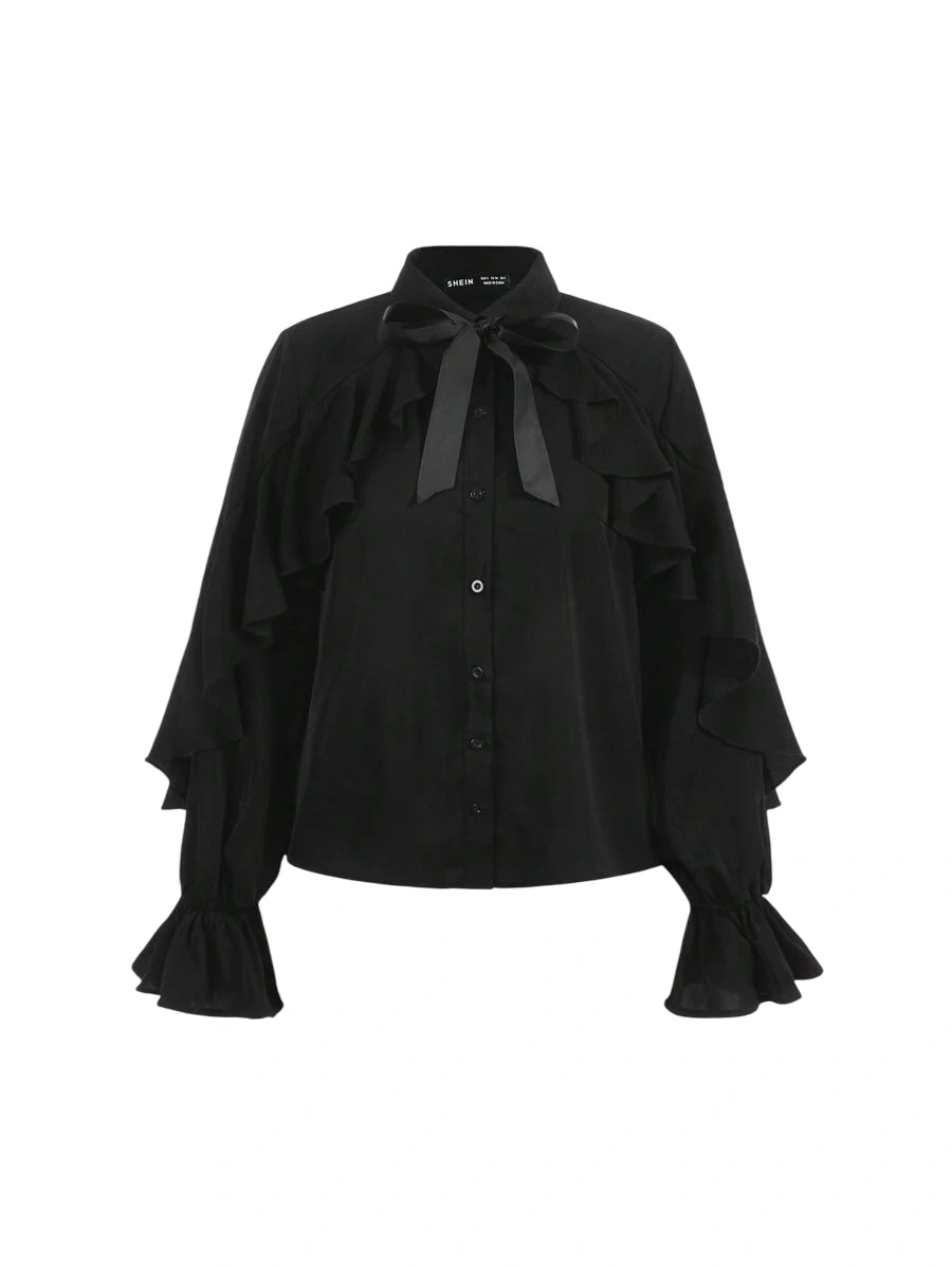 Black ruffle blouse with bow tie and long sleeves